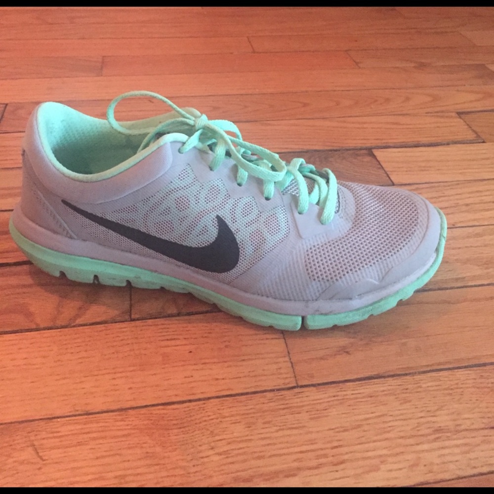 Gray and mint green Nikes