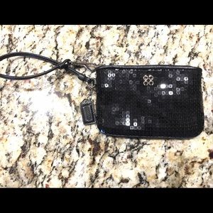 Never used Sequin black Coach wristlet