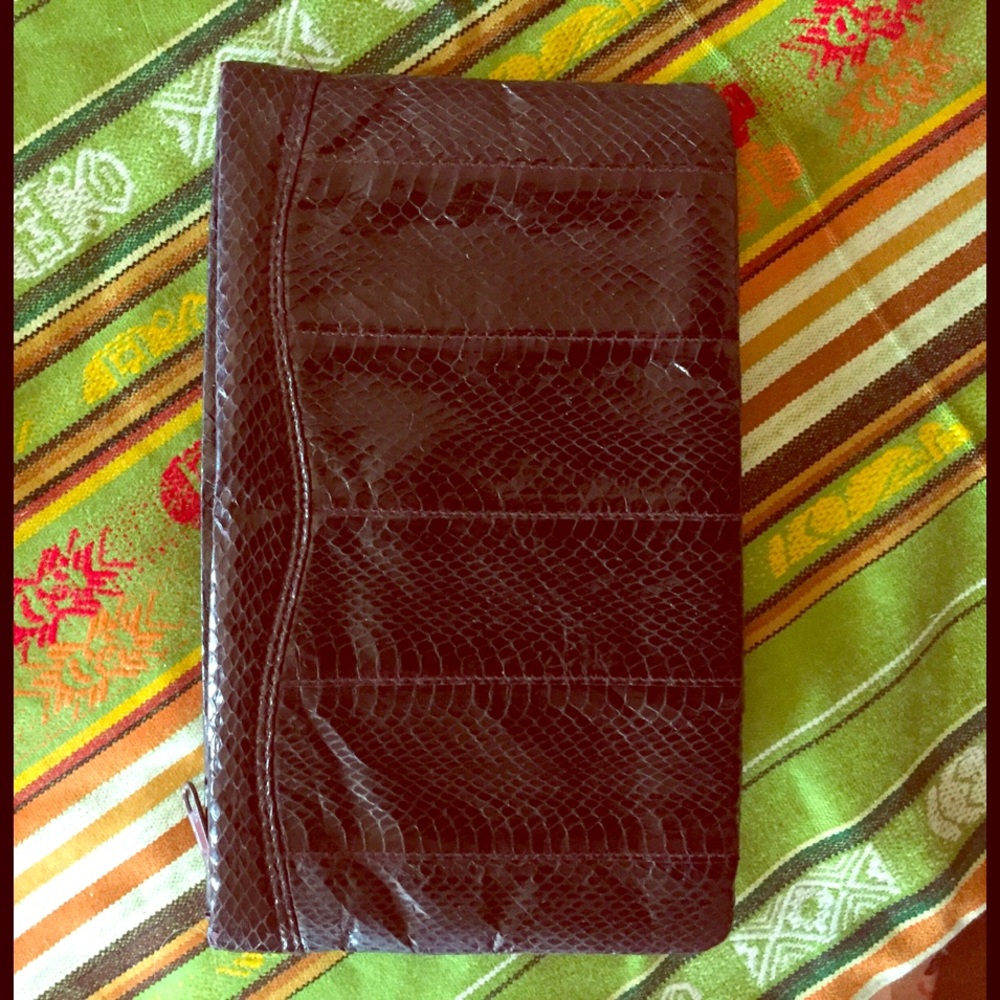 Dark purple vintage snakeskin clutch