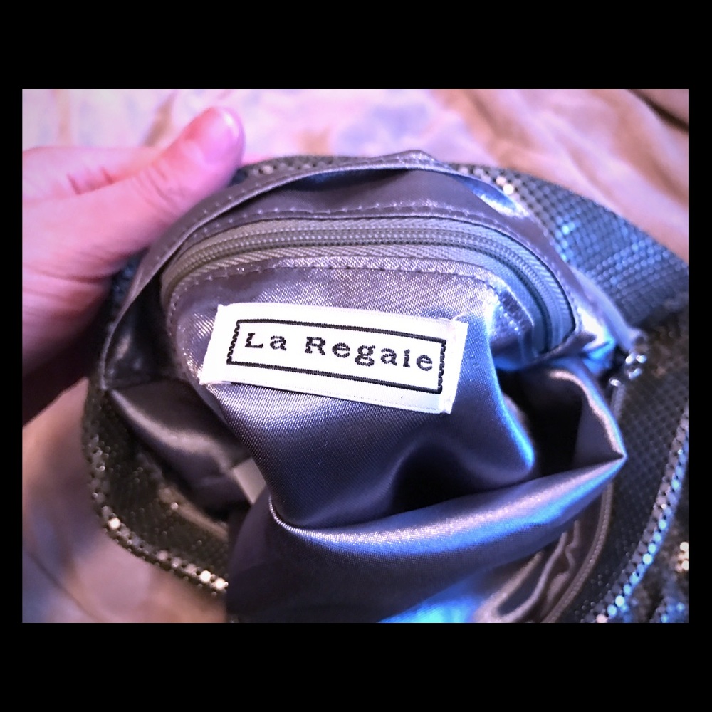 Silver metal La Regale clutch
