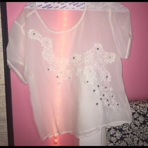 white floral bejeweled blouse