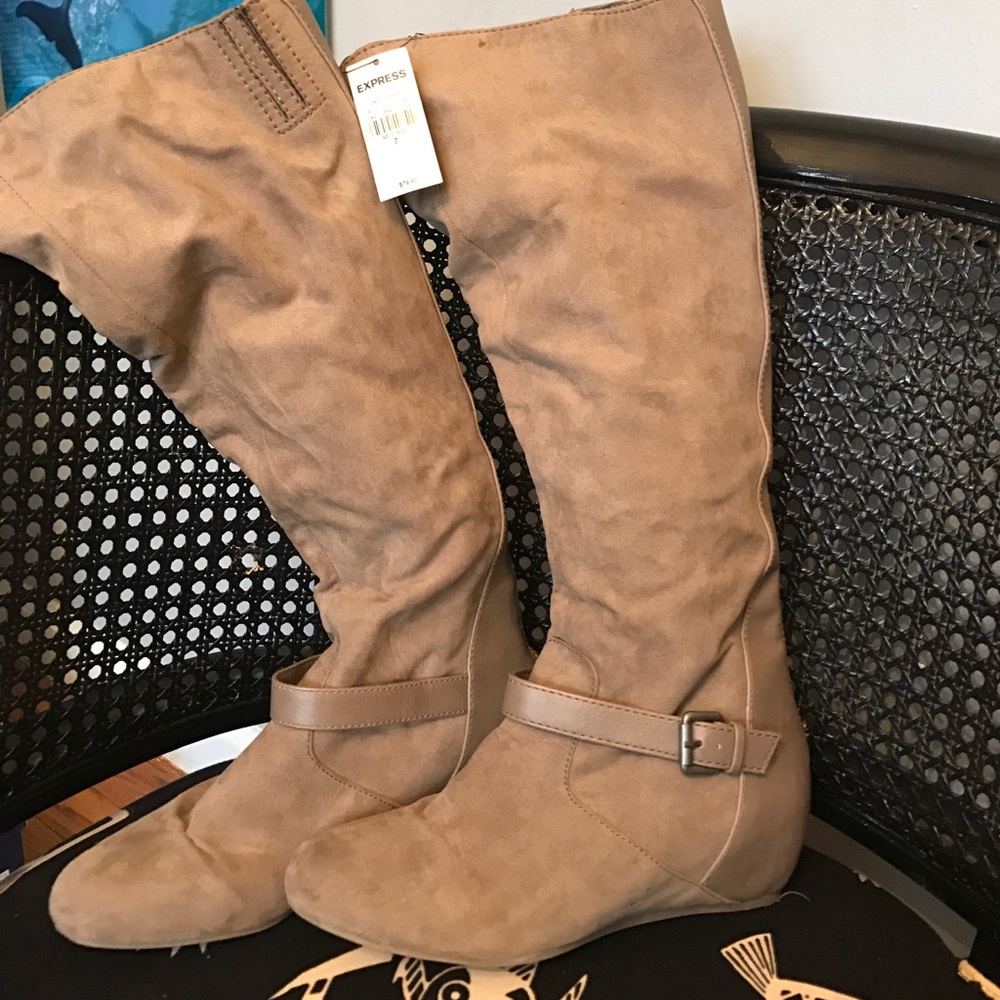 Express boots. Never worn size 7.