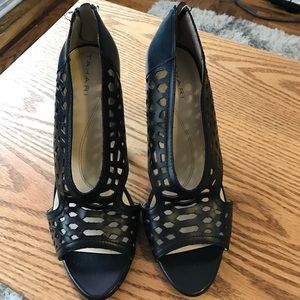Black, open-toed Tahiti heels