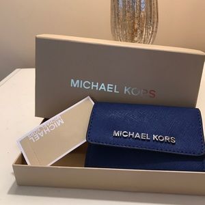 NEW! With Tags and box! Blue leather coin purse.