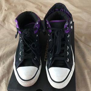 Black and purple converse.