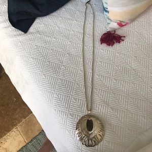 Kendra Scott necklace.