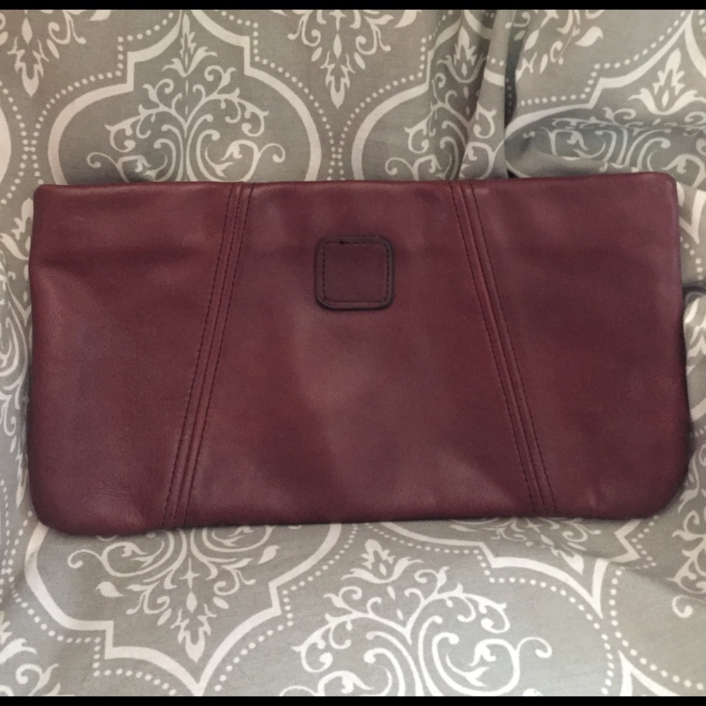 Brown leather clutch