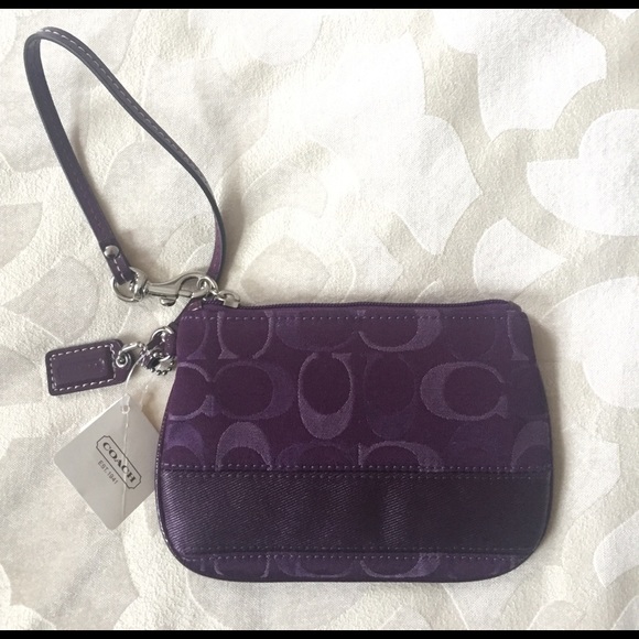 Coach Handbags - Coach plum signature small wristlets NWT