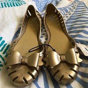Forever21 + Melissa gold jelly shoes with bows