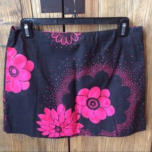 Black and fuchsia floral mini skirt