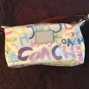 Small coach purse.