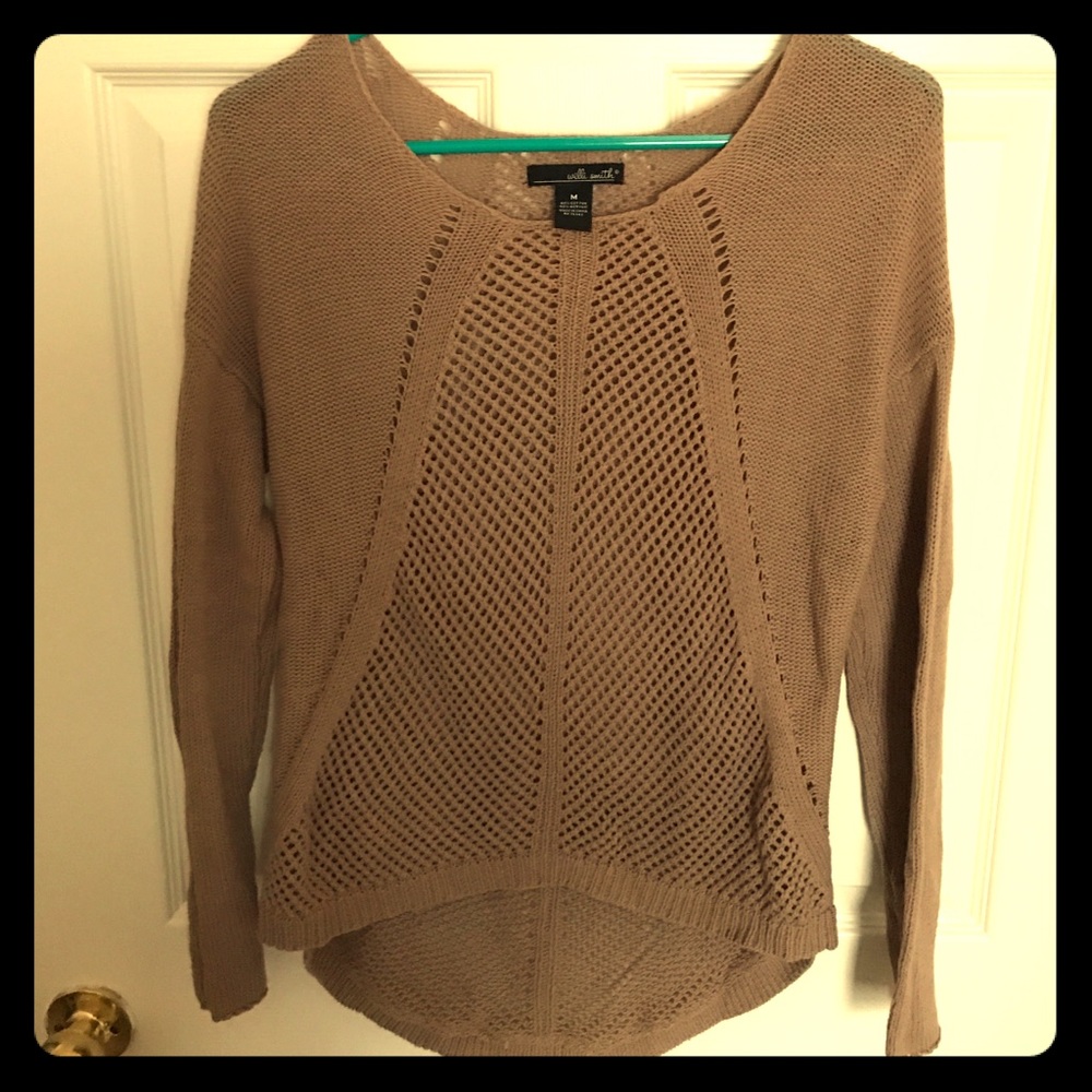 Light brown long sleeve sweater.