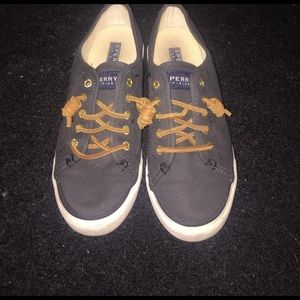 Black and brown sperry top sider shoes