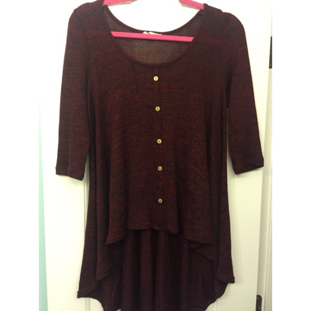 Burgundy shirt with gold buttons