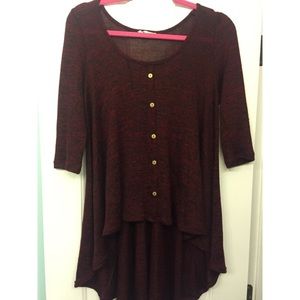 Burgundy shirt with gold buttons