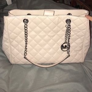 Light pink Michael kors purse and wallet