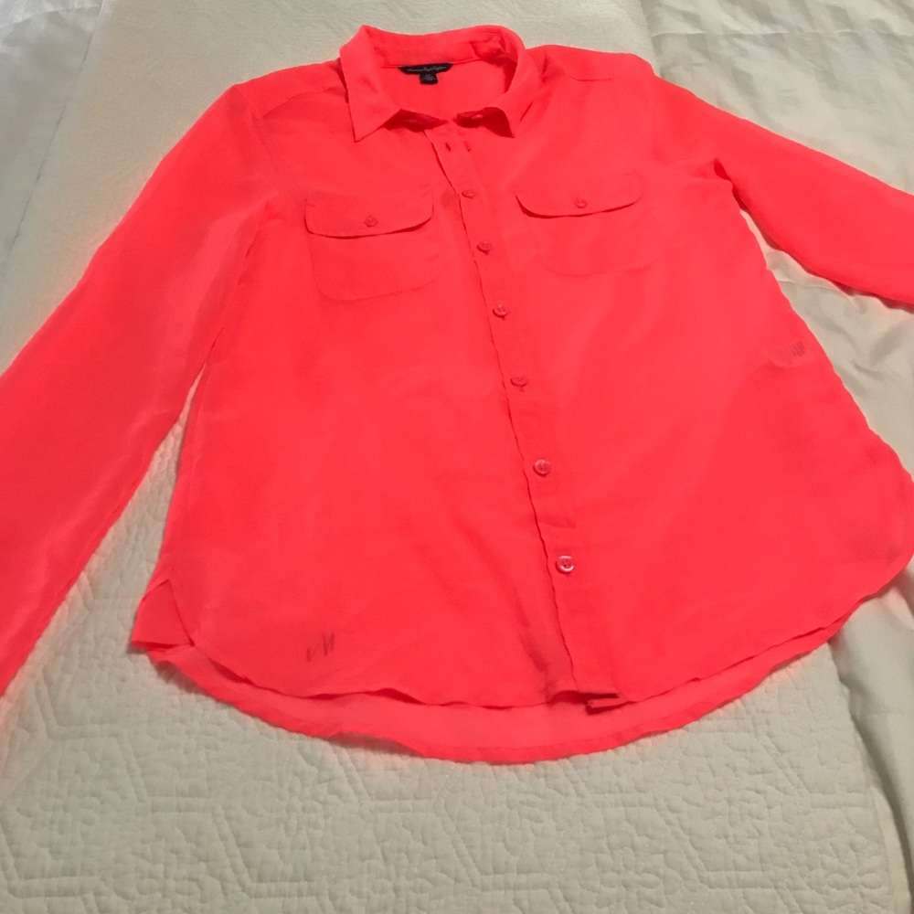 Neon pink blouse