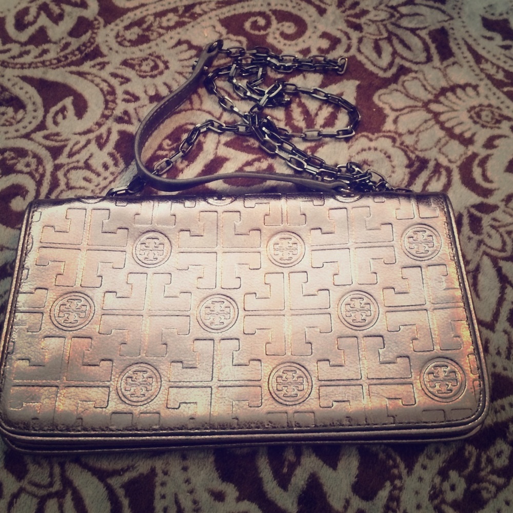 Metallic silver Tory Burch clutch/ crossbody bag