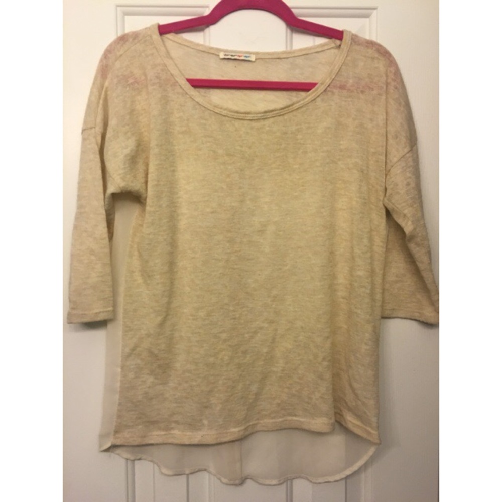 Cream see-thru top with button detailing on back
