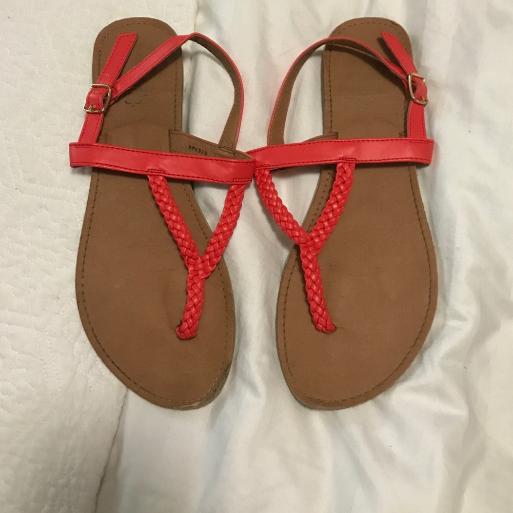 Black shinny bobs and coral strappy sandles