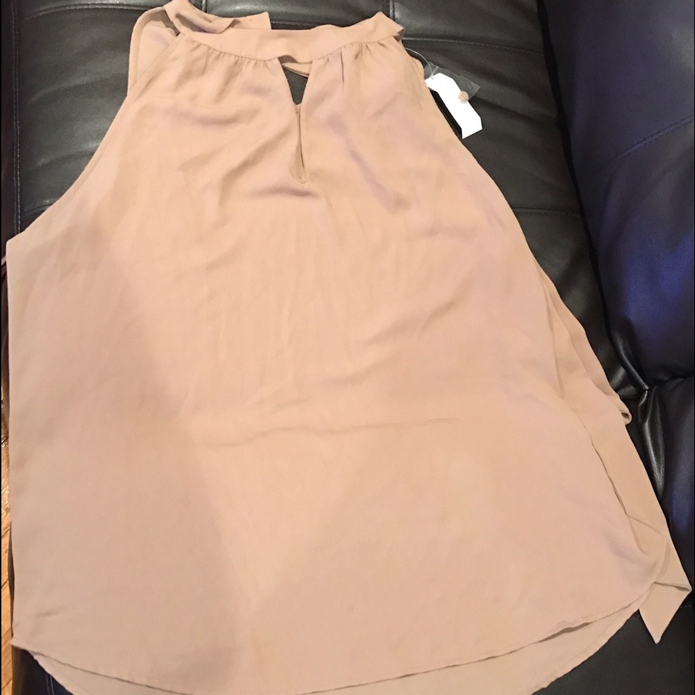 Beige blouse with cute back detail