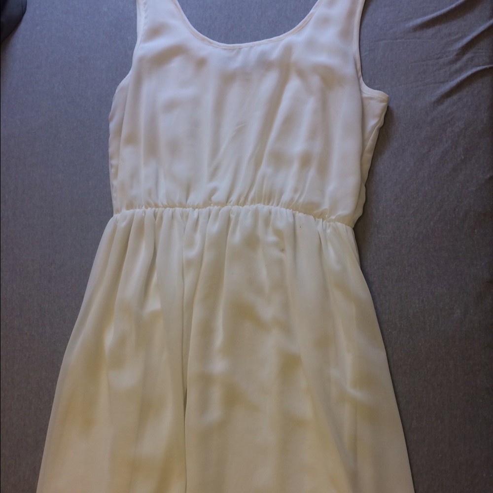 Ivory high-low sleeveless dress