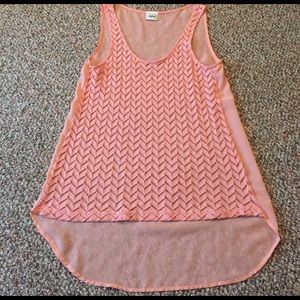 Peach colored Daytrip tank top! Long/see thru back