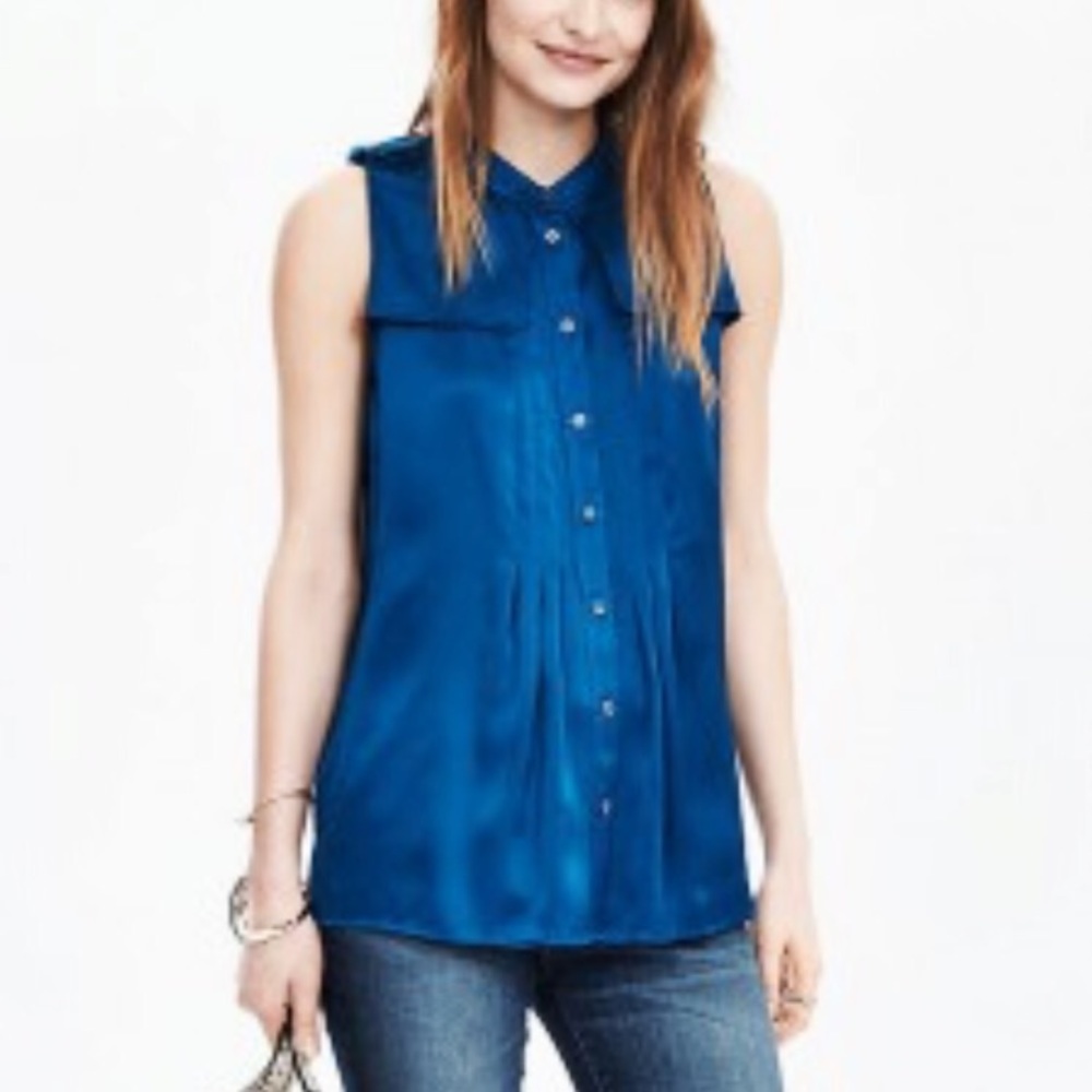 Vibrant blue pleated silk blouse