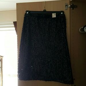 Prices slashed+Sequined skirt, never been worn.