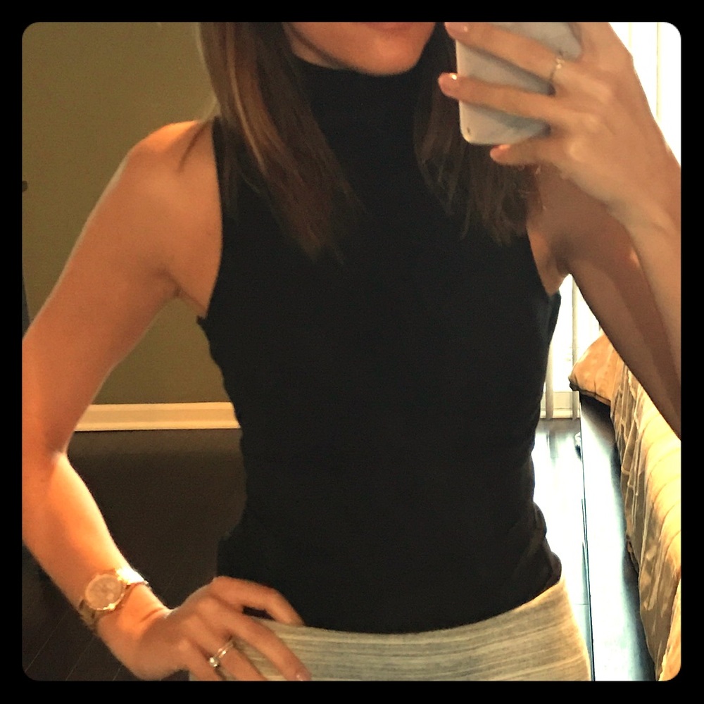 Black stretchy sleeveless turtleneck