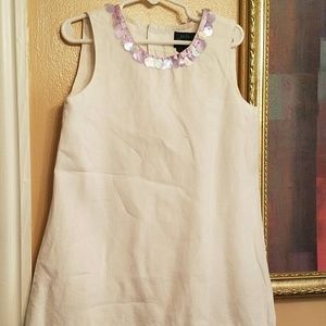 Lovely light colored cream dress.