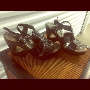 Black wedge style heels with stud detail
