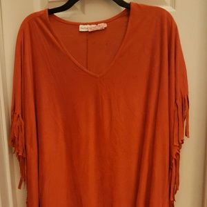Orange/burnt orange side fringe top. Poncho style!