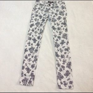 Black and white patterned skinny pants.