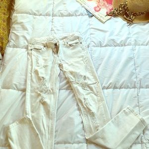 White jeans with rips