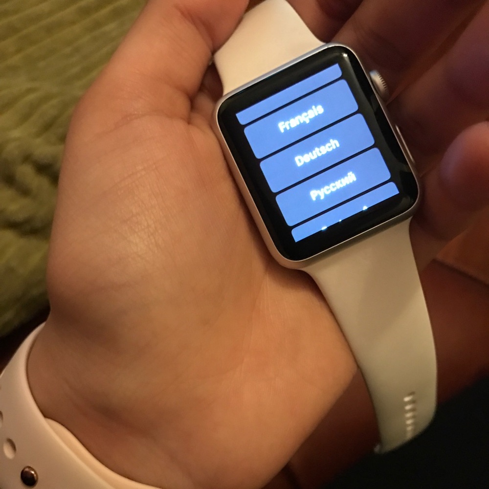 Silver Apple Watch 42 mm & white bands