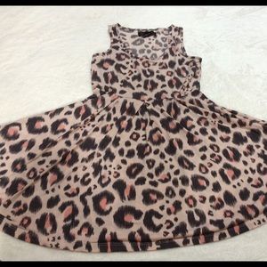 A flowy cheeta print dress