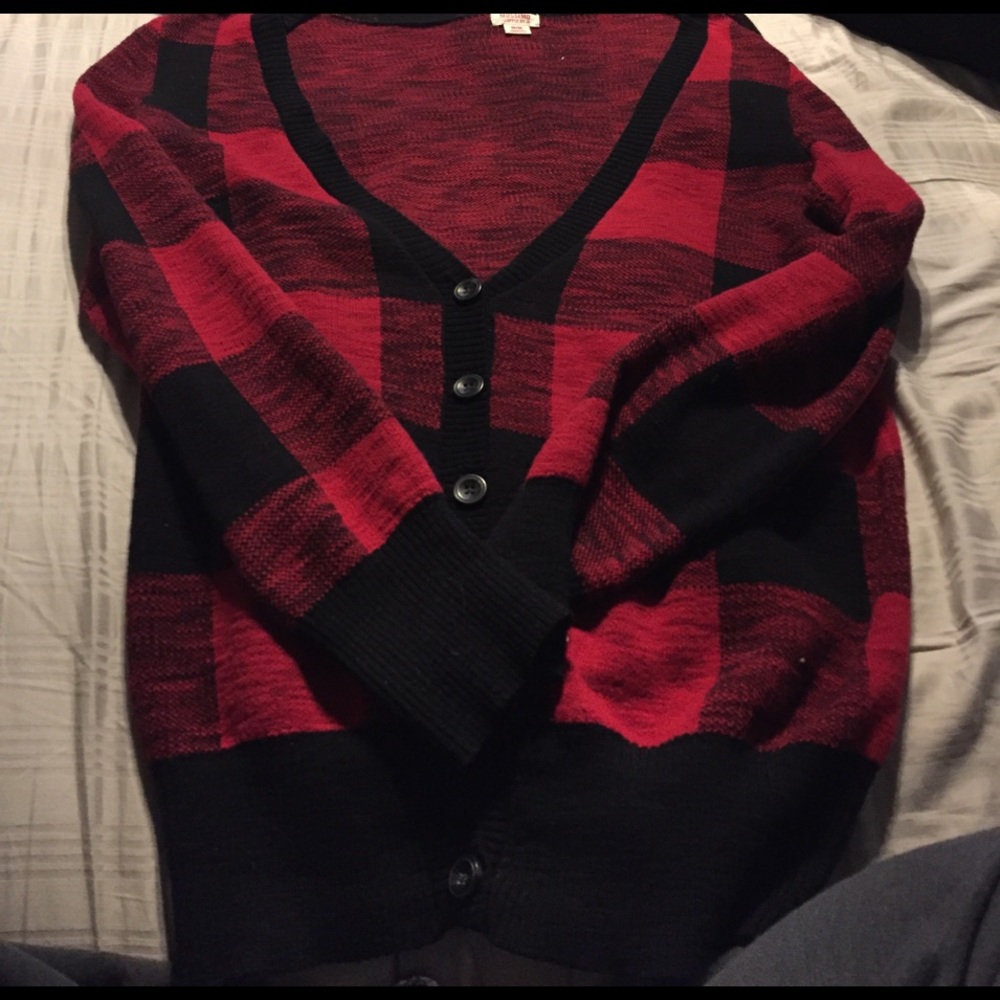 Red and black plaid sweater.