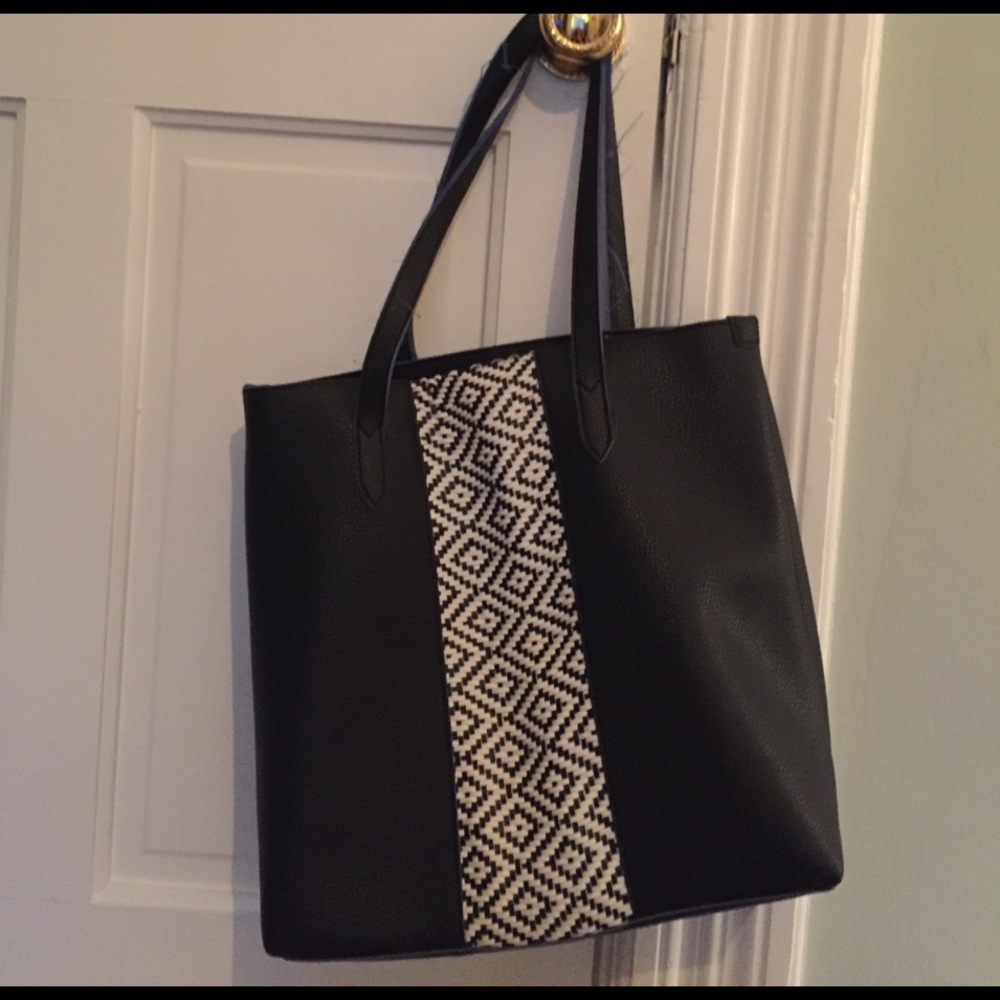 Black + white leather bag