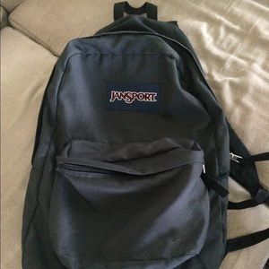 Dark grey Jansport backpack