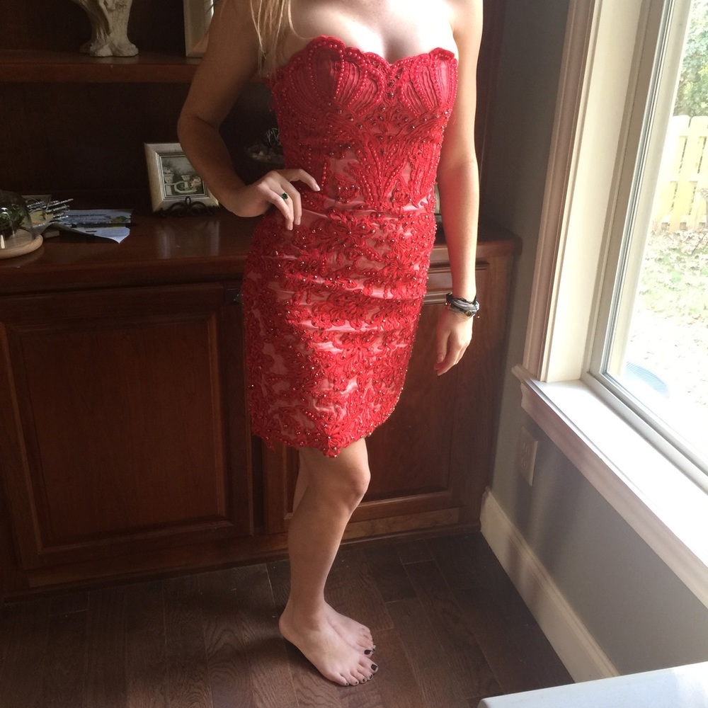 Sherri Hill red cocktail dress.