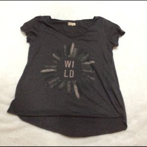 Says "wild" and has feathers around it