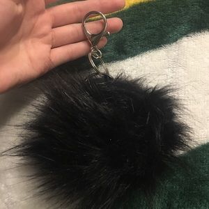 Pom Pom keychain with portable USB charger