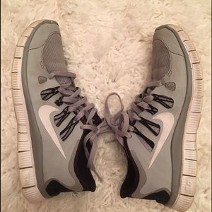 Grey Nike free runs