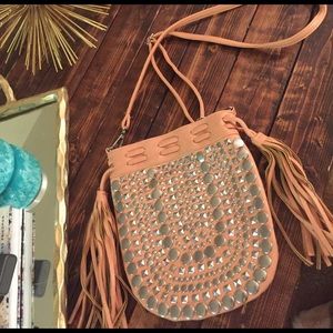 Pink, silver studded purse with fringe tassels!