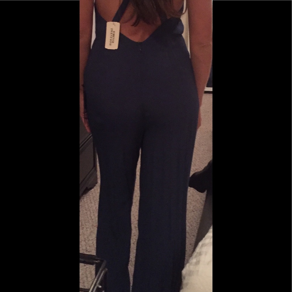Jump suit / romper Perfect for Spring- Never Worn!