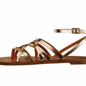 Gently worn gold sandals