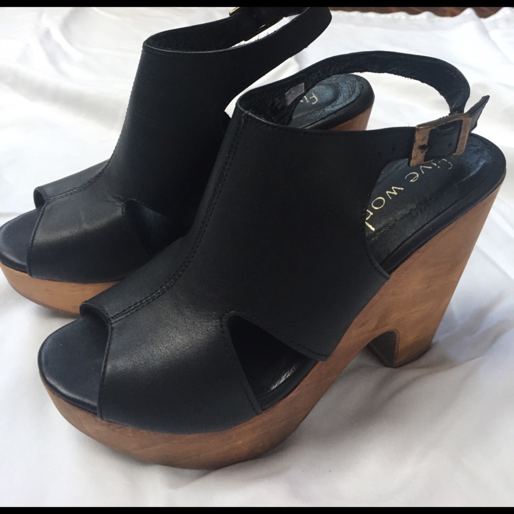 Black leather with wood platforms.