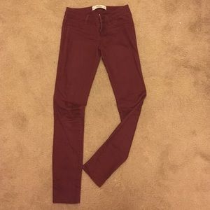 Maroon low-rise colored skinny jeans