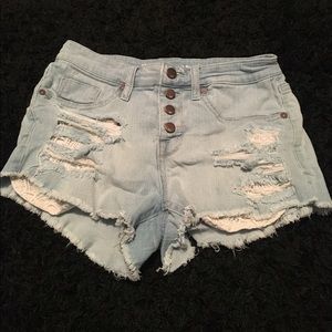 High rise distressed denim shorts